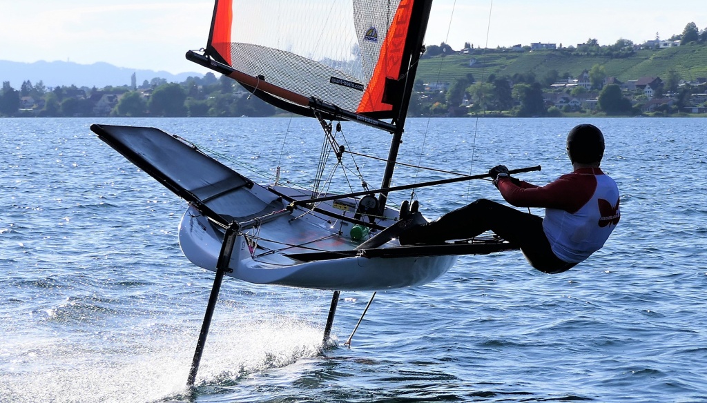 Foiling Melges sailboat